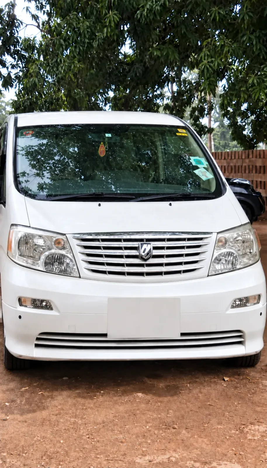 Front view of the Toyota Alphard used for Asilia Zanzibar private driver days